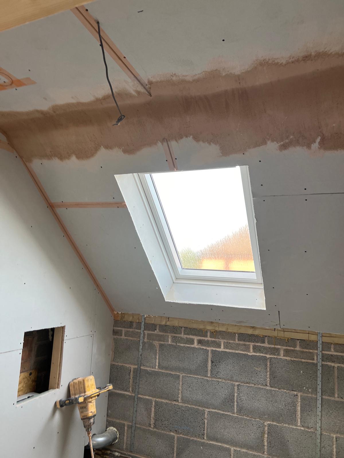 Before plastering around skylight